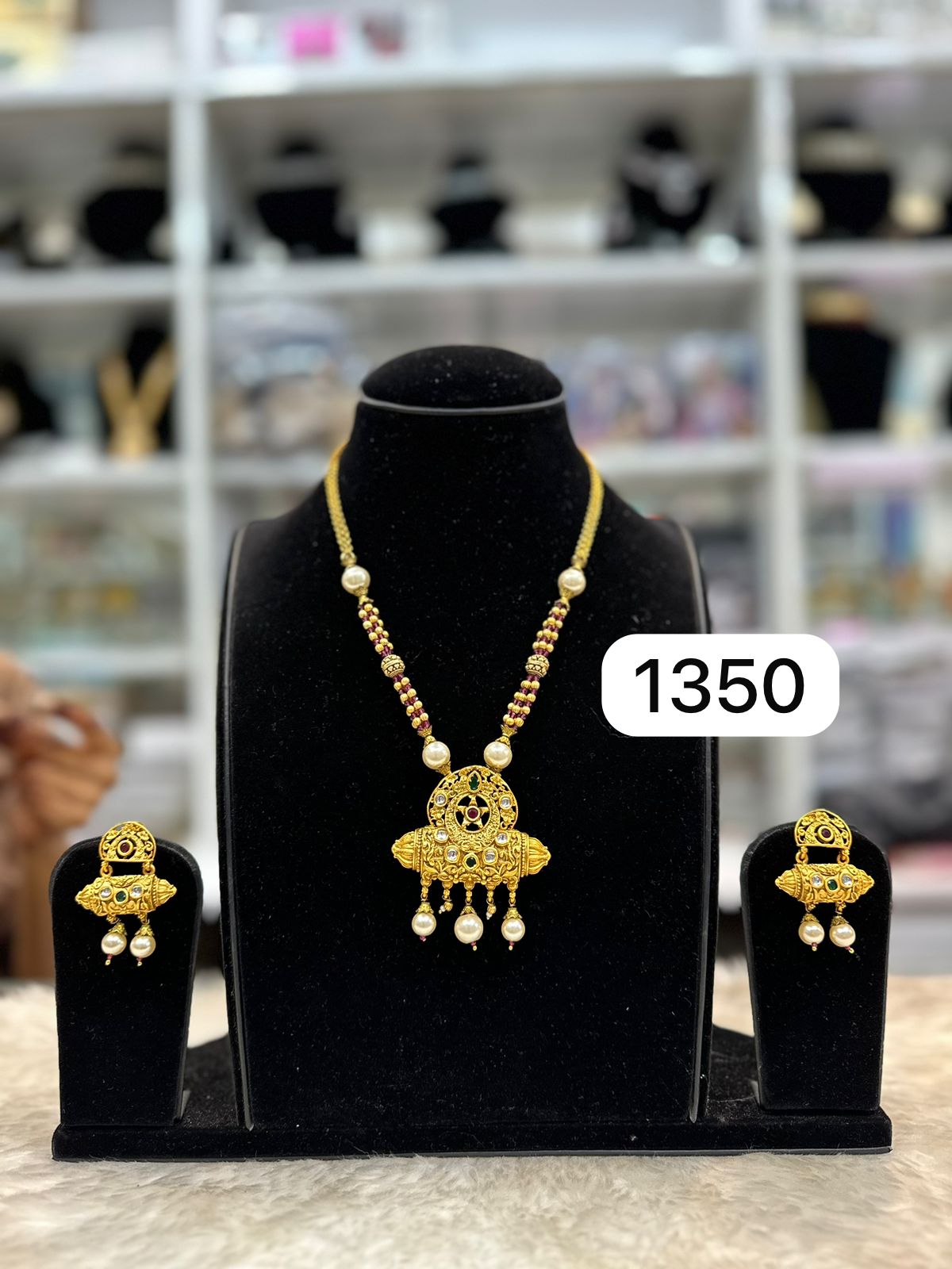 Traditional Golden Pendant Set with Ruby & Green Stones