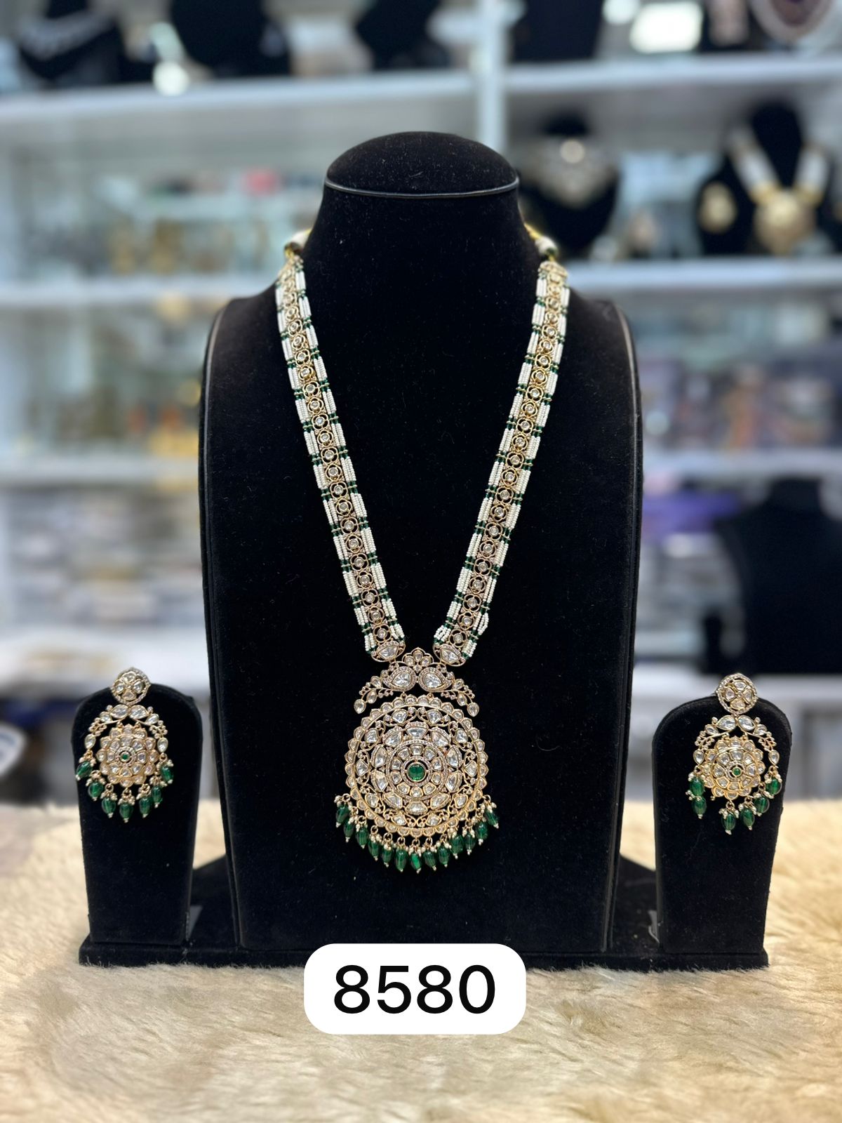 Designer Kiyani Green Kundan Pendant Set