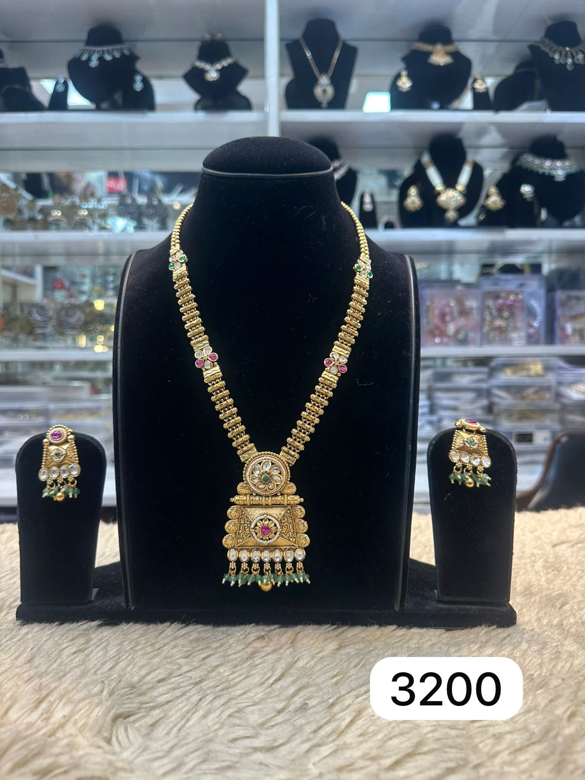 Golden Kundan Pendant Set with Ruby & Green Detailing – Real Look