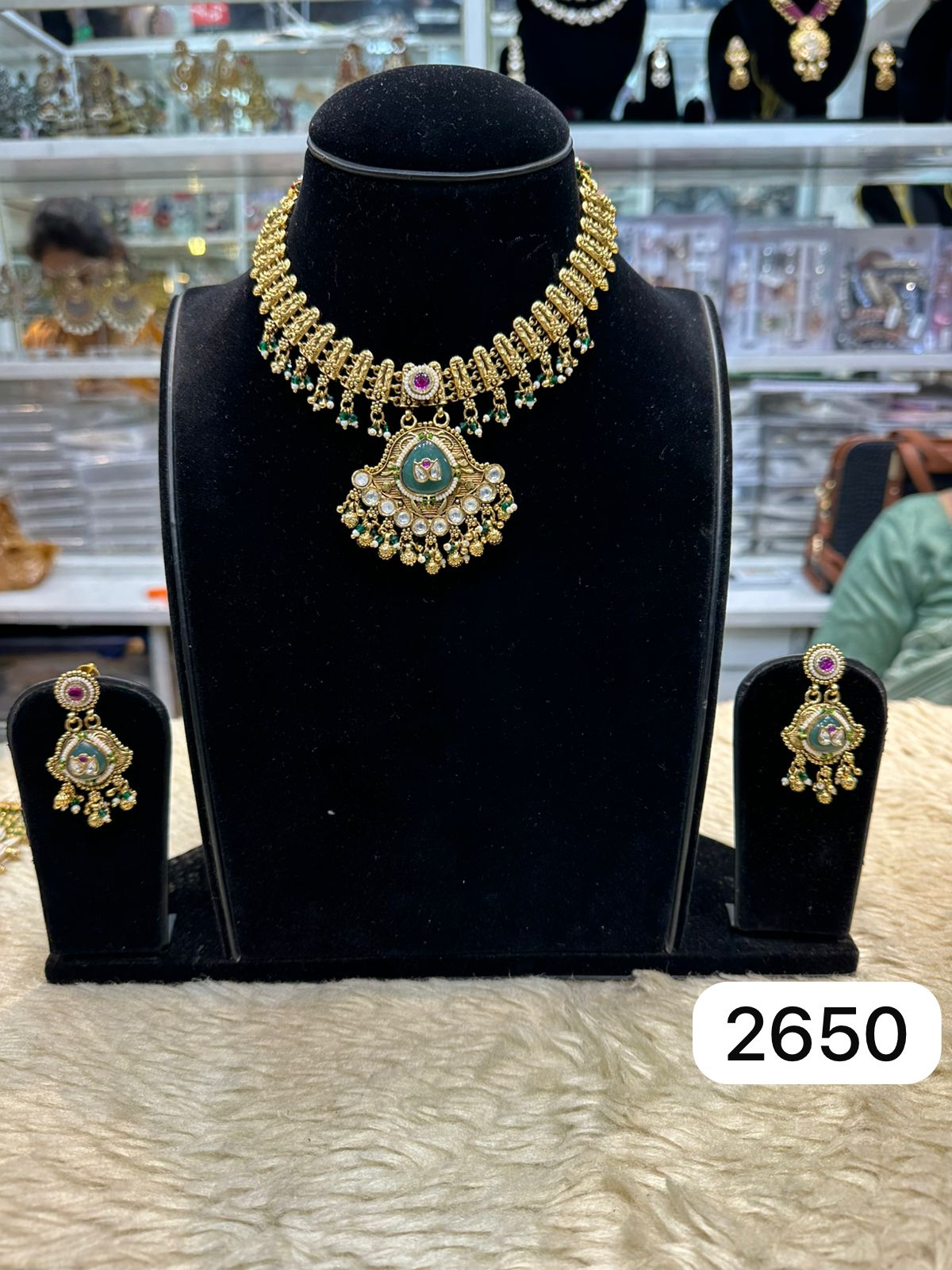 Real look gold set tablet stone rubi green