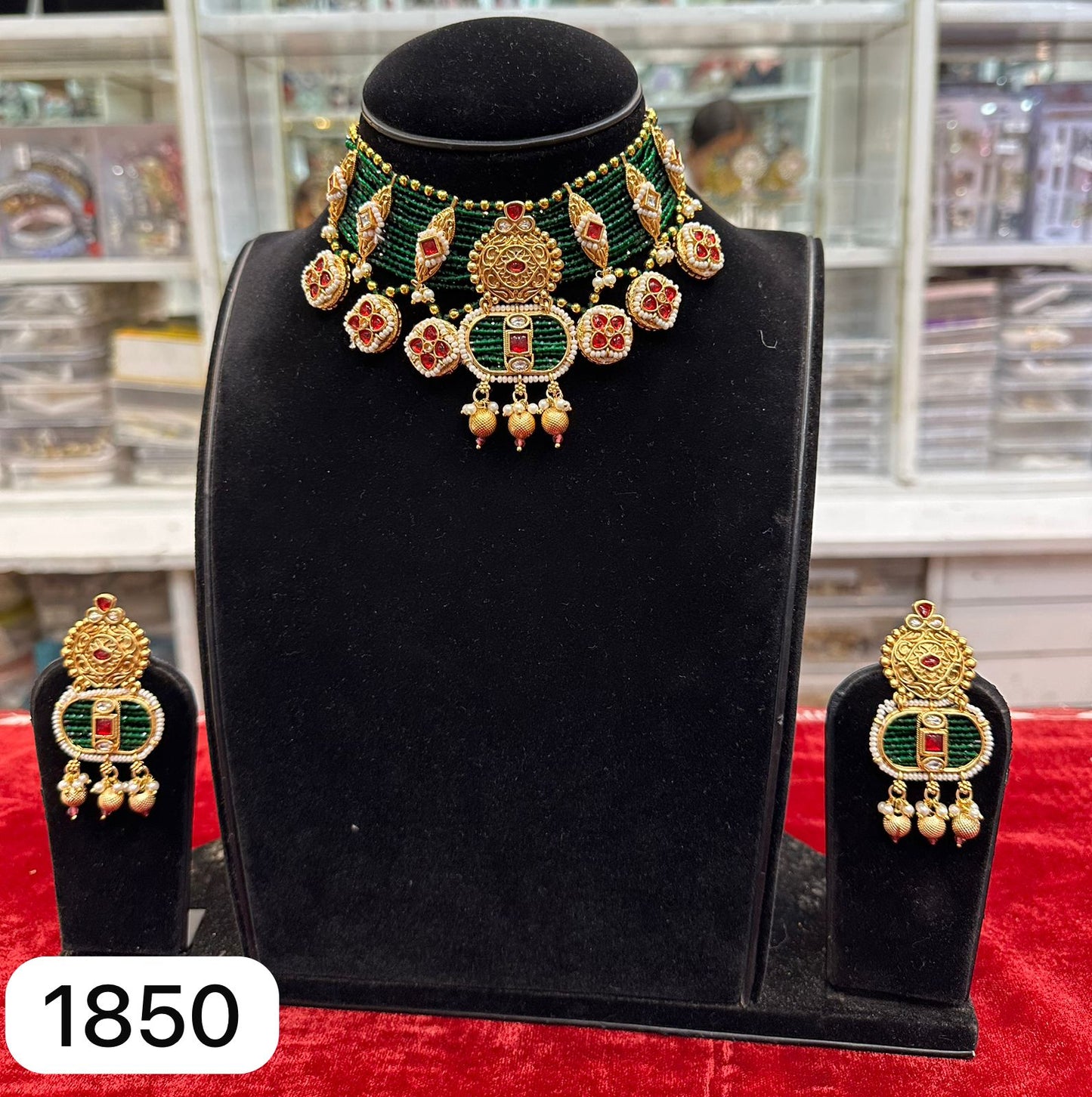 Featured Heavy Dark Green Moti & Kundan Set