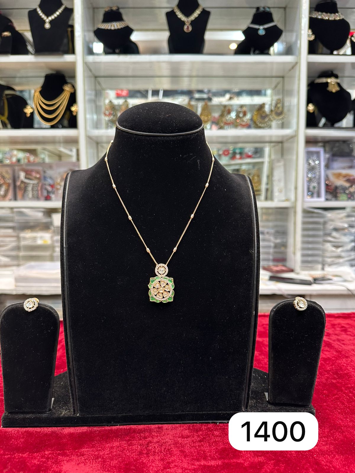 Real Look Kundan Chain Pendant Set with green colour