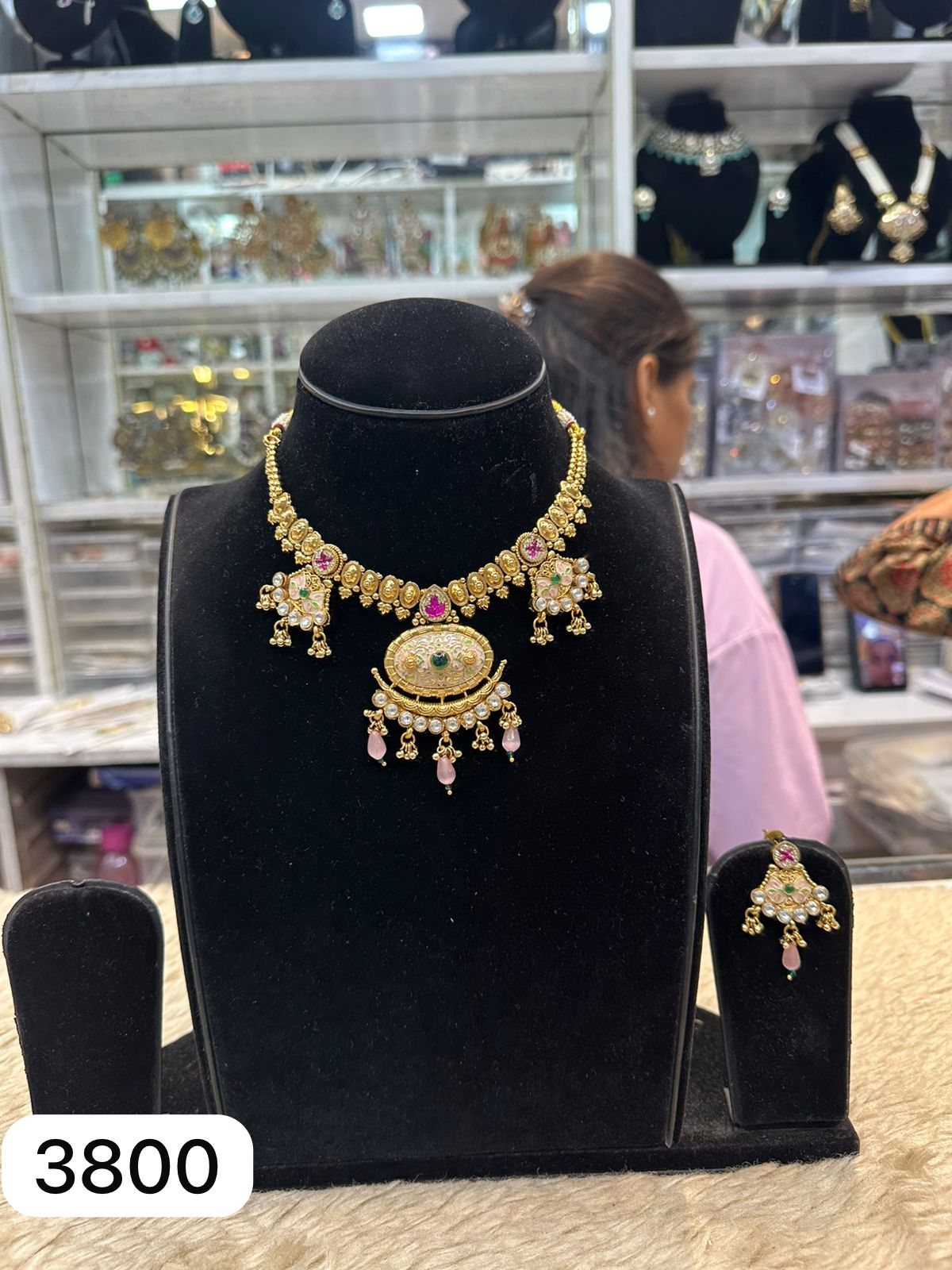 Golden Ruby Set with Green Stone Work