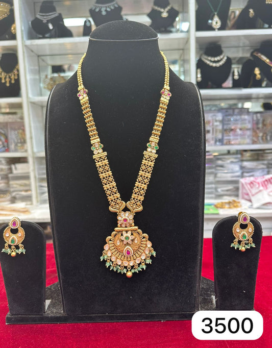Traditional Kundan Pendant Set – Antique Golden Finish with Ruby & Green Stones