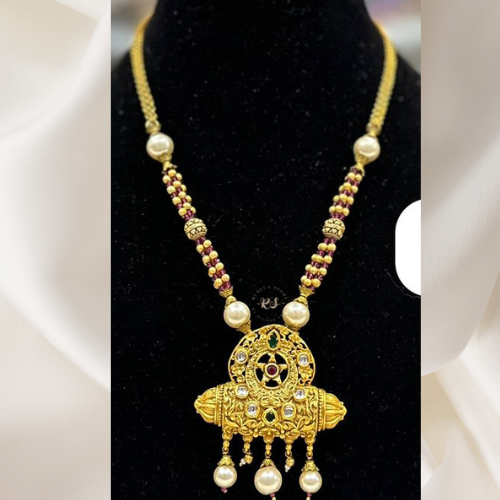 Traditional Golden Pendant Set with Ruby & Green Stones
