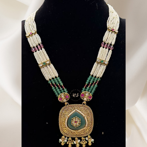 Real Look Pendant with Ruby Green Tablet Stones