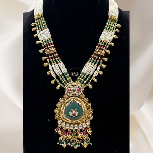 Real Look Pendant with Ruby Green Tablet Stones