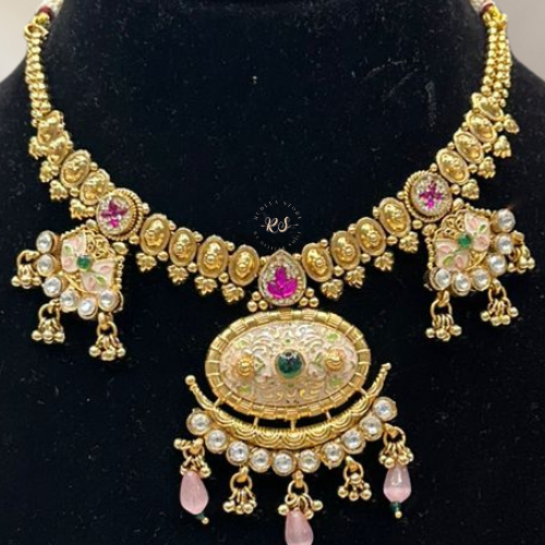 Golden Ruby Set with Green Stone Work