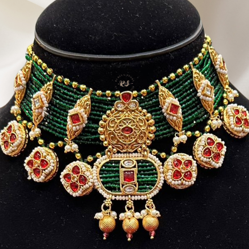 Featured Heavy Dark Green Moti & Kundan Set