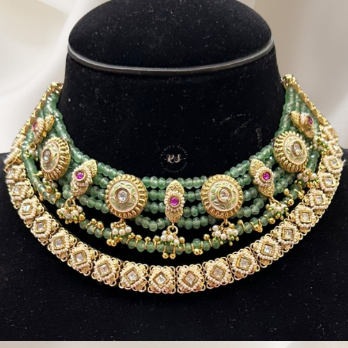 real‑look, gold-tone moti (pearl) layered set with