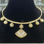 Rubela Store’s Elegant Mosonite Set with Meenakari work – Radiance Redefined